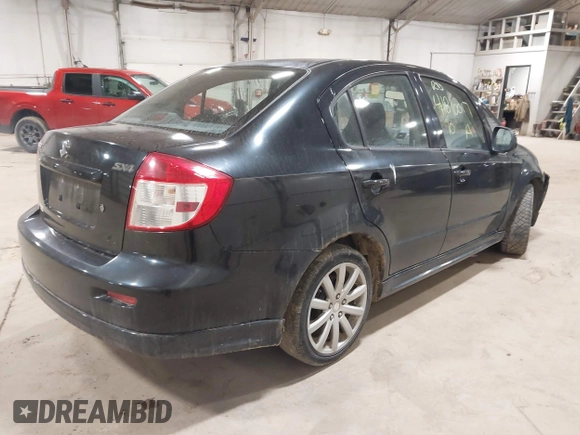 2010 Suzuki SX4 with VIN JS2YC5A40A6300005, listed as a IAAI auction lot 41810017 with 101,896 mi miles and . Bid and sale history available at DreamBid. Image 4.
