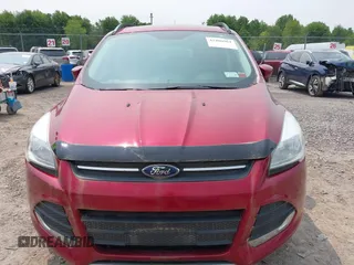 2016 Ford Escape SE z VIN 1FMCU9GX6GUB29495, wystawiony jako IAAI lot #42406964 z przebiegiem 103 892 mil mil oraz . Historia ofert i sprzedaży dostępna na DreamBid. Obrazek 11.