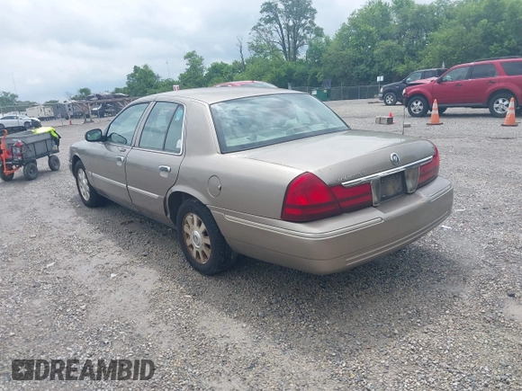 2005 Mercury Grand Marquis LS Premium z VIN 2MEFM75W25X661590, wystawiony jako IAAI lot #42534626 z przebiegiem 113 450 mil mil oraz . Historia ofert i sprzedaży dostępna na DreamBid. Obrazek 3.