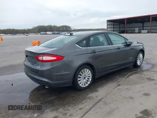 2015 Ford Fusion SE Hybrid with VIN 3FA6P0LU9FR232583, listed as a IAAI auction lot 42012175 with 139,309 mi miles and . Bid and sale history available at DreamBid. Image 4.
