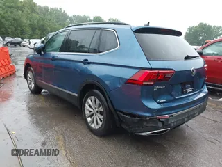2018 Volkswagen Tiguan SEL with VIN 3VV2B7AX4JM019965, listed as a IAAI auction lot 42395783 with 107,822 mi miles and . Bid and sale history available at DreamBid. Image 3.