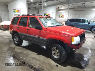 1997 Jeep Grand Cherokee Laredo with VIN 1J4GZ58Y5VC674687, listed as a Copart auction lot 43137095 with 173,228 mi miles and Salvage Title. Bid and sale history available at carsss.com. Image 4.