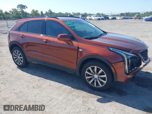2019 Cadillac XT4 FWD Sport z VIN 1GYFZER4XKF103780, wystawiony jako IAAI lot #42171306 z przebiegiem 99 260 mil mil oraz . Historia ofert i sprzedaży dostępna na DreamBid. Obrazek 1.