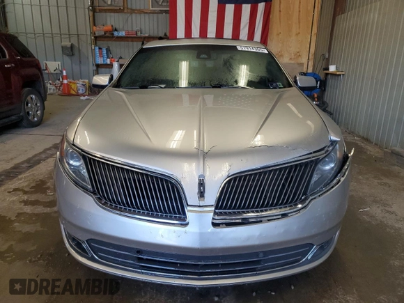 2013 Lincoln MKS z VIN 1LNHL9EK0DG605184, wystawiony jako Copart lot #51914305 z przebiegiem 173 117 mil mil oraz Szkoda całkowita • Salvage title. Historia ofert i sprzedaży dostępna na DreamBid. Obrazek 5.