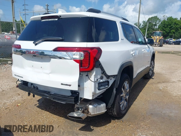 2021 GMC Acadia SLT with VIN 1GKKNMLS7MZ105137, listed as a IAAI auction lot 42526856 with 16,290 mi miles and . Bid and sale history available at DreamBid. Image 4.