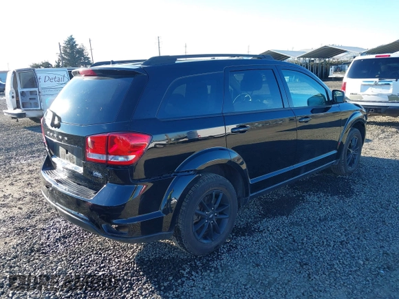 2019 Dodge Journey SE with VIN 3C4PDCBB5KT841465, listed as a IAAI auction lot 41558770 with 84,090 mi miles and . Bid and sale history available at DreamBid. Image 4.