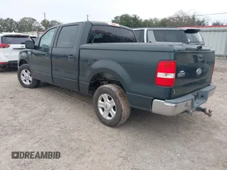 2004 Ford F-150 XLT with VIN 1FTRW12W64KB46944, listed as a IAAI auction lot 41208511 with 293,981 mi miles. Bid and sale history available at carsss.com. Image 3.