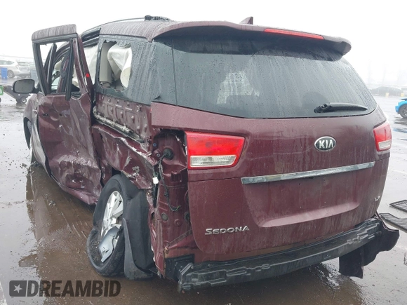 2016 Kia Sedona LX with VIN KNDMB5C17G6144987, listed as a IAAI auction lot 41569757 with 164,539 mi miles. Bid and sale history available at carsss.com. Image 3.