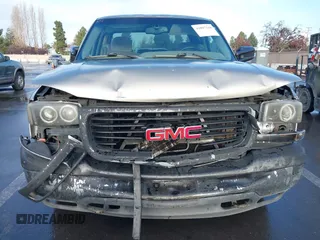 2000 GMC Sierra 1500 SLT with VIN 1GTEC19T6YZ167647, listed as a IAAI auction lot 41097210 with Not Provided miles and . Bid and sale history available at carsss.com. Image 6.