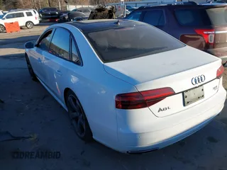 2018 Audi A8 L with VIN WAU44AFD7JN000598, listed as a IAAI auction lot 41313616 with 112,811 mi miles. Bid and sale history available at carsss.com. Image 3.