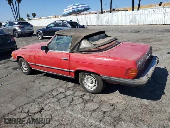 1985 Mercedes-Benz SL with VIN WDBBA45C9FA017476, listed as a Copart auction lot 74177774 with 135,805 mi miles and Salvage title. Bid and sale history available at DreamBid. Image 2.