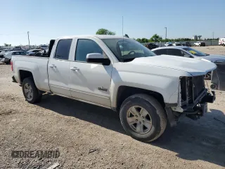 2018 Chevrolet Silverado 1500 LT with VIN 1GCRCREC2JZ217553, listed as a Copart auction lot 51945385 with 117,514 mi miles and Salvage Title. Bid and sale history available at DreamBid. Image 4.