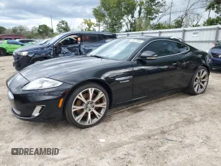2013 Jaguar XK with VIN SAJWA4FB3DLB50331, listed as a Copart auction lot 66573384 with 109,887 mi miles and Salvage Title. Bid and sale history available at carsss.com. Image 1.