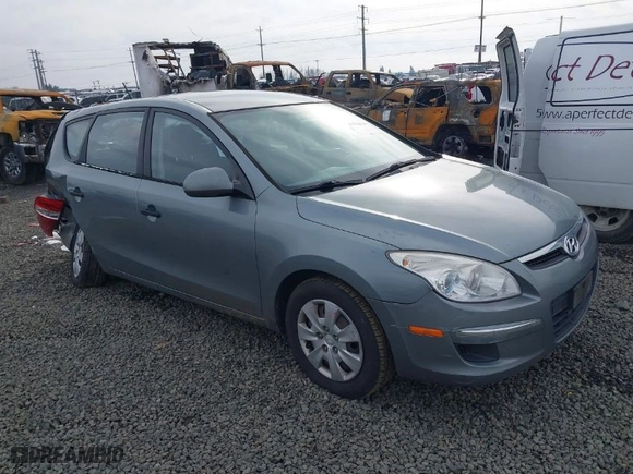 2010 Hyundai Elantra Touring GLS with VIN KMHDB8AE2AU051834, listed as a IAAI auction lot 41556140 with 107,206 mi miles. Bid and sale history available at carsss.com. Image 1.
