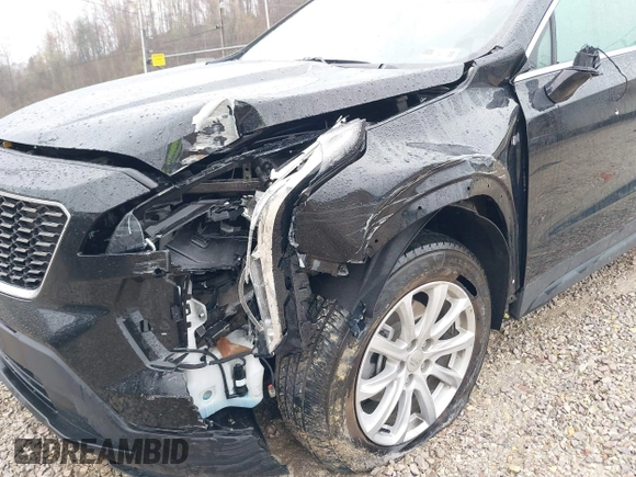2023 Cadillac XT4 AWD Luxury with VIN 1GYFZBR42PF103973, listed as a IAAI auction lot 41902923 with 70,571 mi miles and . Bid and sale history available at DreamBid. Image 6.