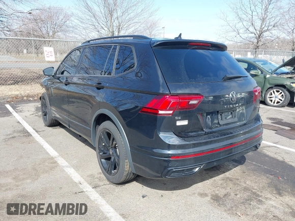2023 Volkswagen Tiguan SE R-Line Black with VIN 3VVCB7AXXPM094621, listed as a IAAI auction lot 41737103 with 21,069 mi miles and . Bid and sale history available at DreamBid. Image 3.