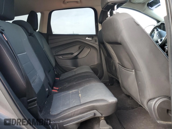 2014 Ford Escape SE z VIN 1FMCU9GX3EUE26446, wystawiony jako Copart lot #57113865 z przebiegiem 145 699 mil mil oraz Szkoda całkowita • Salvage title. Historia ofert i sprzedaży dostępna na DreamBid. Obrazek 11.