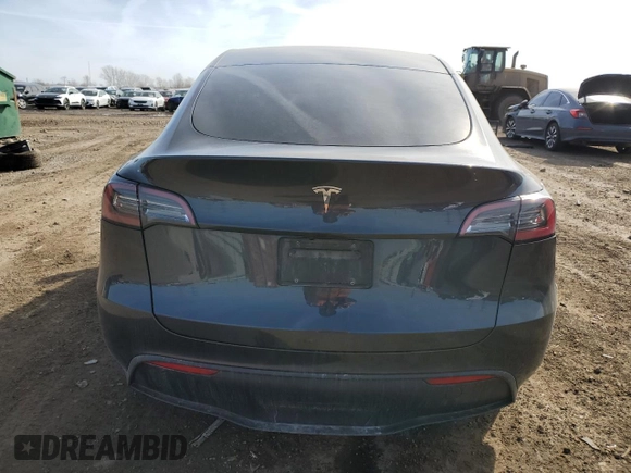 2024 Tesla Model Y with VIN 7SAYGDED7RF163537, listed as a Copart auction lot 48639255 with 7,193 mi miles and Salvage Title. Bid and sale history available at DreamBid. Image 6.