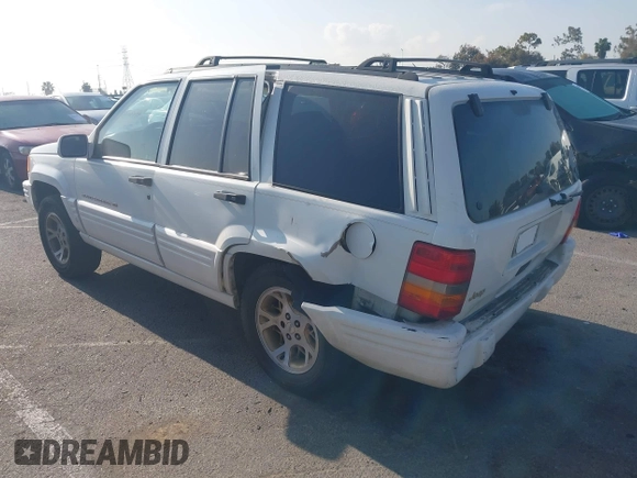 1998 Jeep Grand Cherokee with VIN 1J4FX78S2WC281501, listed as a IAAI auction lot 42140170 with 177,575 mi miles and . Bid and sale history available at DreamBid. Image 3.