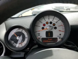 2011 MINI Convertible with VIN WMWZN3C53BTZ89332, listed as a Copart auction lot 45945515 with 25,809 mi miles and Salvage title. Bid and sale history available at DreamBid. Image 9.