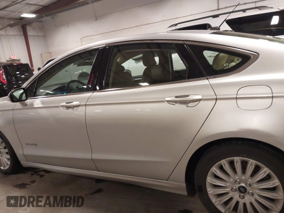2015 Ford Fusion SE Hybrid with VIN 3FA6P0LU7FR266702, listed as a IAAI auction lot 41390791 with 94,465 mi miles. Bid and sale history available at carsss.com. Image 15.