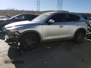 2020 Mazda CX-5 Touring with VIN JM3KFBCM3L0793369, listed as a Copart auction lot 49724385 with 88,470 mi miles and Salvage Title. Bid and sale history available at carsss.com. Image 1.
