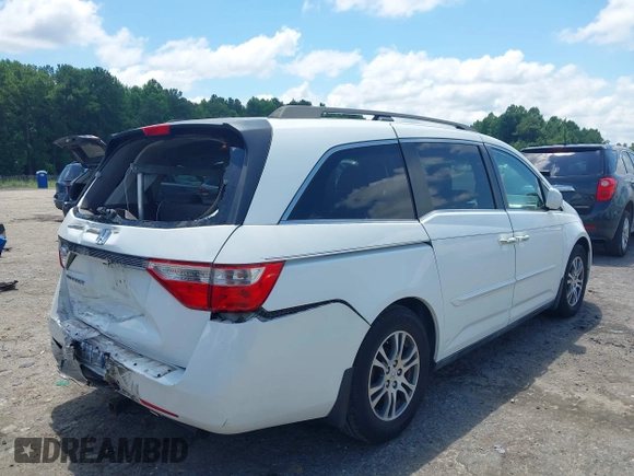 2011 Honda Odyssey EX-L with VIN 5FNRL5H6XBB002461, listed as a IAAI auction lot 42662720 with 145,672 mi miles and . Bid and sale history available at DreamBid. Image 4.