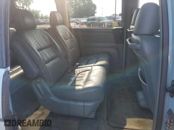 2003 Honda Odyssey EX-L с VIN 2HKRL18033H501741, выставлен на аукционе Copart как лот 60496865 с пробегом Не указан миль и Списание • Salvage title. История ставок и продаж доступна на DreamBid. Изображение 11.