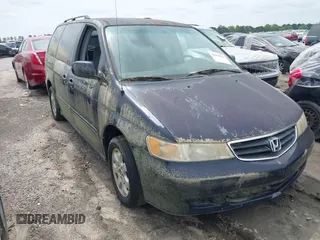 2004 Honda Odyssey EX-RES z VIN 5FNRL18874B132825, wystawiony jako IAAI lot #41978812 z przebiegiem 147 792 mil mil oraz . Historia ofert i sprzedaży dostępna na DreamBid. Obrazek 6.