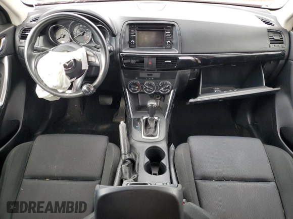 2015 Mazda CX-5 Sport with VIN JM3KE4BY9F0479748, listed as a Copart auction lot 58847805 with 122,698 mi miles and Salvage title. Bid and sale history available at DreamBid. Image 8.