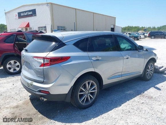 2019 Acura RDX w/Technology Pkg with VIN 5J8TC2H56KL028081, listed as a IAAI auction lot 40042142 with 76,899 mi miles. Bid and sale history available at carsss.com. Image 4.