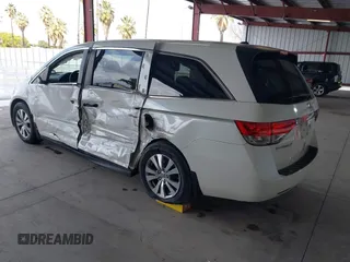 2015 Honda Odyssey EX-L with VIN 5FNRL5H64FB084175, listed as a IAAI auction lot 41943540 with 67,902 mi miles and . Bid and sale history available at carsss.com. Image 3.