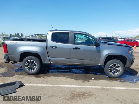 2021 Chevrolet Colorado 4WD Z71 with VIN 1GCGTDEN9M1249916, listed as a IAAI auction lot 41947042 with 26,842 mi miles. Bid and sale history available at carsss.com. Image 13.