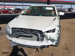 2012 Buick LaCrosse Leather with VIN 1G4GC5E36CF346542, listed as a IAAI auction lot 41360669 with 127,333 mi miles. Bid and sale history available at carsss.com. Image 6.