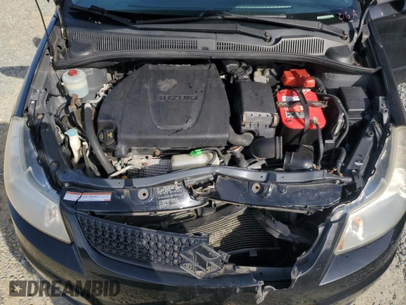 2010 Suzuki SX4 Touring with VIN JS2YB5A70A6300518, listed as a Copart auction lot 45526315 with 161,090 mi miles and Salvage Title. Bid and sale history available at carsss.com. Image 11.