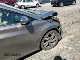2014 Hyundai Elantra Limited z VIN 5NPDH4AEXEH477637, wystawiony jako Copart lot #52564715 z przebiegiem 131 561 mil mil oraz Szkoda całkowita • Salvage title. Historia ofert i sprzedaży dostępna na DreamBid. Obrazek 11.