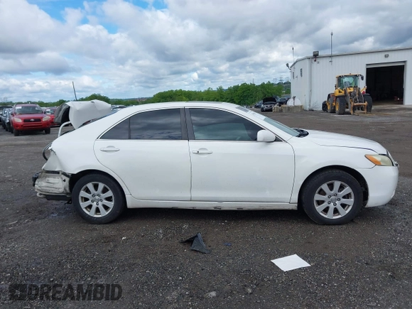 2009 Toyota Camry LE z VIN 4T1BK46K59U588966, wystawiony jako IAAI lot #42343044 z przebiegiem 157 284 mil mil oraz . Historia ofert i sprzedaży dostępna na DreamBid. Obrazek 12.