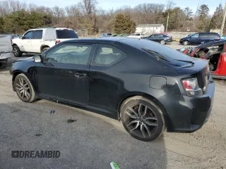 2016 Scion tC with VIN JTKJF5C79GJ018910, listed as a Copart auction lot 43444515 with 120,884 mi miles and Salvage Title. Bid and sale history available at carsss.com. Image 2.