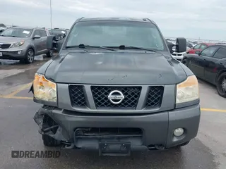 2010 Nissan Titan Pro-4X with VIN 1N6BA0EC9AN323943, listed as a IAAI auction lot 42795482 with 200,453 mi miles and . Bid and sale history available at DreamBid. Image 12.