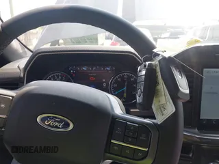 2023 Ford F-150 XL z VIN 1FTEW1EP6PKF23103, wystawiony jako IAAI lot #42390868 z przebiegiem 15 149 mil mil oraz . Historia ofert i sprzedaży dostępna na DreamBid. Obrazek 11.