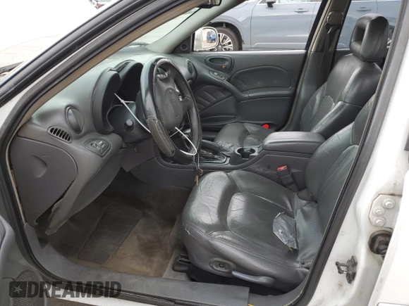 2000 Pontiac Grand Am GT with VIN 1G2NW52E2YM799735, listed as a Copart auction lot 51782455 with 181,850 mi miles and Salvage title. Bid and sale history available at DreamBid. Image 7.