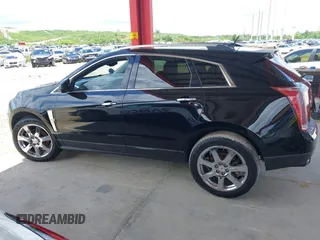 2012 Cadillac SRX Premium Collection z VIN 3GYFNCE36CS615725, wystawiony jako IAAI lot #42738584 z przebiegiem 156 625 mil mil oraz . Historia ofert i sprzedaży dostępna na DreamBid. Obrazek 14.