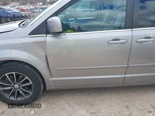 2017 Dodge Grand Caravan SXT with VIN 2C4RDGCG6HR671199, listed as a IAAI auction lot 42031157 with 99,189 mi miles and . Bid and sale history available at DreamBid. Image 18.