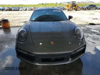 2022 Porsche 911 Turbo S z VIN WP0AD2A91NS255589, wystawiony jako Copart lot #60695644 z przebiegiem 6 562 mil mil oraz Nie do naprawy • Non repairable. Historia ofert i sprzedaży dostępna na DreamBid. Obrazek 5.