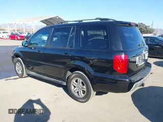 2003 Honda Pilot EX z VIN 2HKYF18713H612854, wystawiony jako IAAI lot #41344126 z przebiegiem 152 331 mil mil oraz . Historia ofert i sprzedaży dostępna na DreamBid. Obrazek 3.