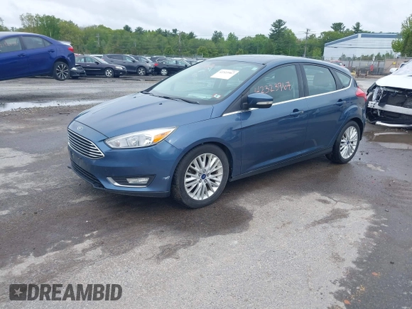 2018 Ford Focus Titanium with VIN 1FADP3N29JL242428, listed as a IAAI auction lot 42323967 with 200,662 mi miles and . Bid and sale history available at DreamBid. Image 2.