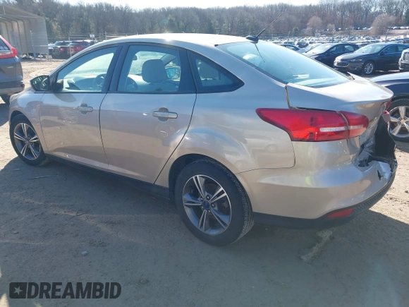 2018 Ford Focus SE with VIN 1FADP3FE8JL256698, listed as a IAAI auction lot 41757179 with 118,498 mi miles. Bid and sale history available at carsss.com. Image 3.