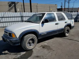 1996 Chevrolet Blazer z VIN 1GNCS13W2T2160393, wystawiony jako Copart lot #70889204 z przebiegiem 118 286 mil mil oraz Czysty tytuł • Clean title. Historia ofert i sprzedaży dostępna na DreamBid. Obrazek 1.