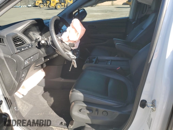 2021 Honda Odyssey EX-L with VIN 5FNRL6H78MB019258, listed as a Copart auction lot 52496285 with 33,734 mi miles and Salvage Title. Bid and sale history available at DreamBid. Image 7.
