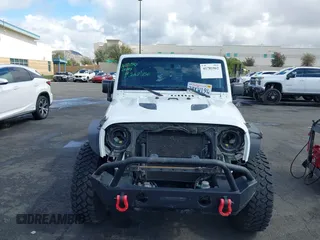 2016 Jeep Wrangler Unlimited Rubicon with VIN 1C4HJWFG7GL254143, listed as a IAAI auction lot 41781962 with 114,435 mi miles and . Bid and sale history available at DreamBid. Image 13.